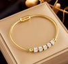 14K Gold Plated Titanium Steel Bracelet with Rhinestone Accents and Magnetic Clasp