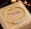 14K Gold Plated Titanium Steel Bracelet with Rhinestone Accents and Magnetic Clasp