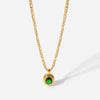 Stainless steel gold plated figaro chain necklace with oval emerald CZ pendant