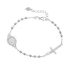 Sterling silver medallion and cross bracelet with clear CZ detail