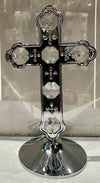Silver cross on base with clear crystals