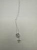 Sterling silver necklace with tiny cross and crystal details