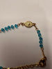 Aquamarine glass stone bracelet with Cross and virgin Mary medal