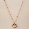 Sterling silver rose gold plated chain with bead detail and rose gold plated open heart pendant