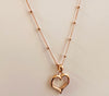 Sterling silver rose gold plated chain with bead detail and rose gold plated open heart pendant