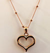 Sterling silver rose gold plated chain with bead detail and rose gold plated open heart pendant