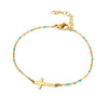 Gold-Plated Stainless-Steel Cross Bracelet with little turquoise beads