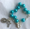 ROSARY BRACELET – LIGHT BLUE WITH CROSS AND MEDAL