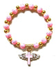Pink elastic Bracelet with gold cross