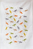 A white cotton tea towel printed with small kangaroos in solid colours of grey, green, mustard and brown interspersed with green grass tufts