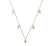 Gold cross charm necklace