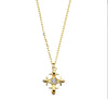 Gold necklace featuring fleur de lis CZ pendant