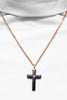 haematite cross with gold chain