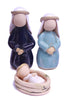 The holy family, Joseph, Mary and the baby Jesus in a manger. Ceramic figures without faces. White, dark blue and pale blue shiny glaze on pale ceramic.