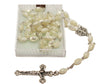 catholic rosary beads made of mother of pearl with a metal crucifix